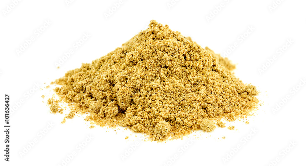Macro of pile of ginger powder studio isolated on white backgrou Macro of pile of ginger powder studio isolated on white backgrou