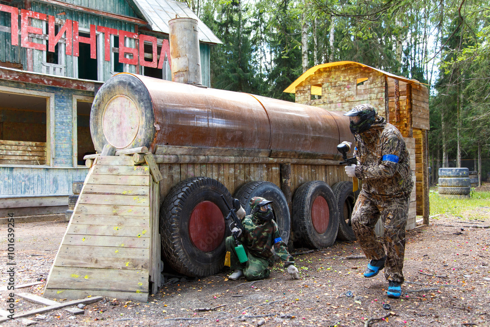 Εκτύπωση καμβά Episode of paintball battle with sign Paintball on background