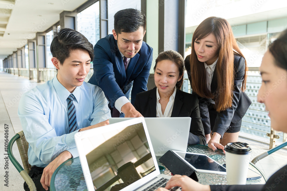 Group of business people discuss about project planning Group of business people discuss about project planning
