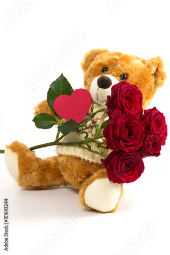 Teddy bear with roses and heart