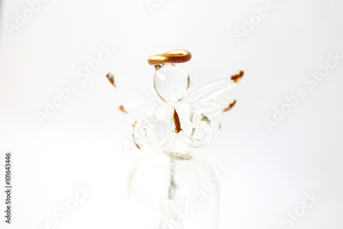Glass angel on a white background.