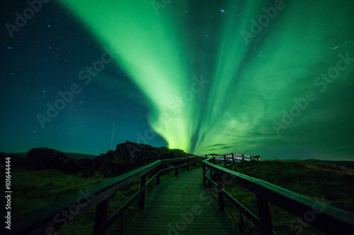 Aurora borealis above a walkway