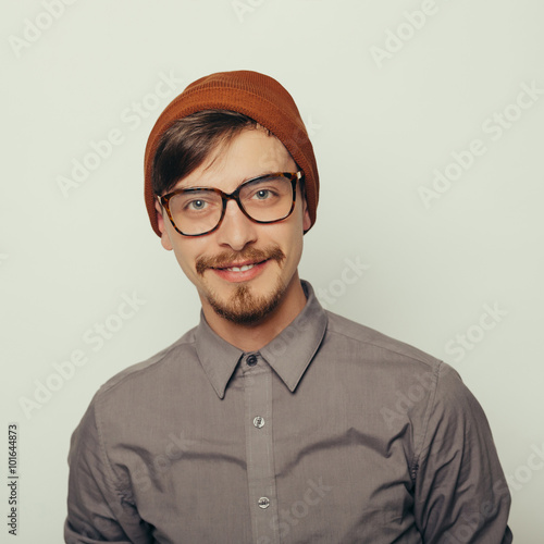 Portrait of an interesting young man in winter clothes