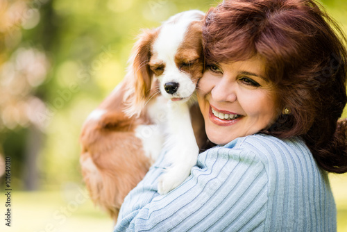 Woman with her dog in nature