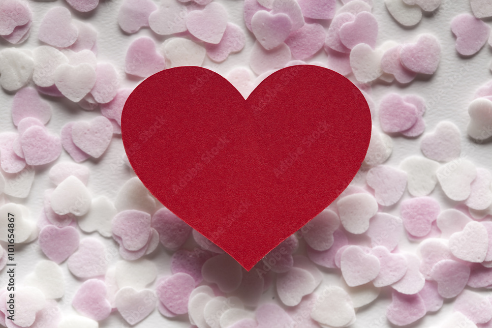 Fototapeta premium Red heart and pink hearts in background
