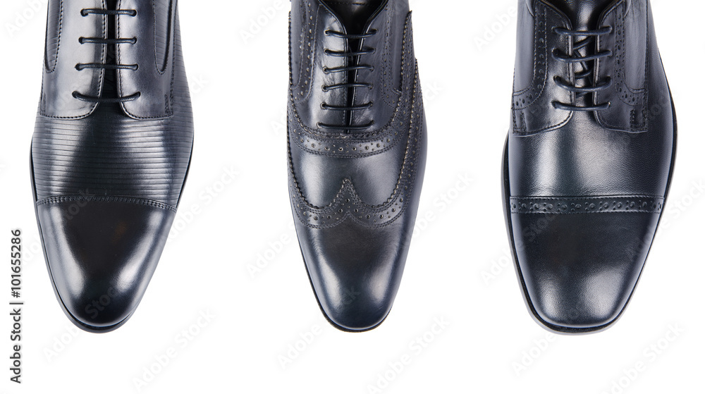 Selection of male shoes isolated on white Selection of male shoes isolated on white
