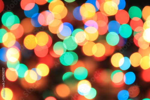 Background with blurred round different color lights 