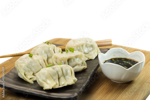 Gyoza asian appetizer on white background with copy space for message.