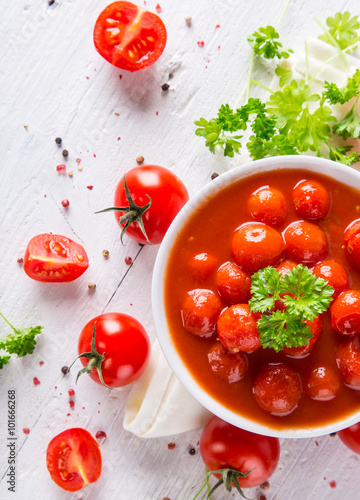 Bowl of tomato sauce and ch...