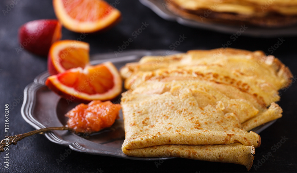 Pancakes with jam of red oranges.selective focus. Pancakes with jam of red oranges.selective focus.