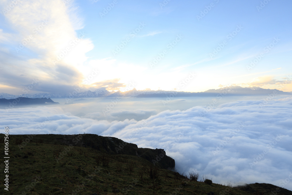 beautiful rolling clouds and sunrise on frozen mountain summits landscape beautiful rolling clouds and sunrise on frozen mountain summits landscape
