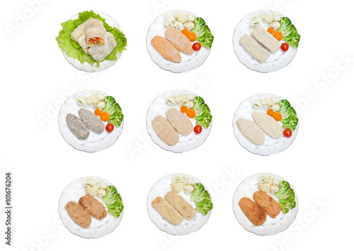 Raw cutlets and cabbage rolls on plates. With cauliflower, broccoli and tomatoes, isolated on white background. A set of 9 photos