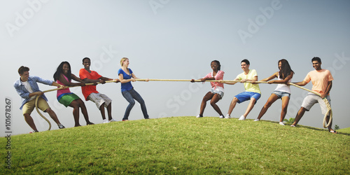 Group Casual People Playing Tug War Concept
