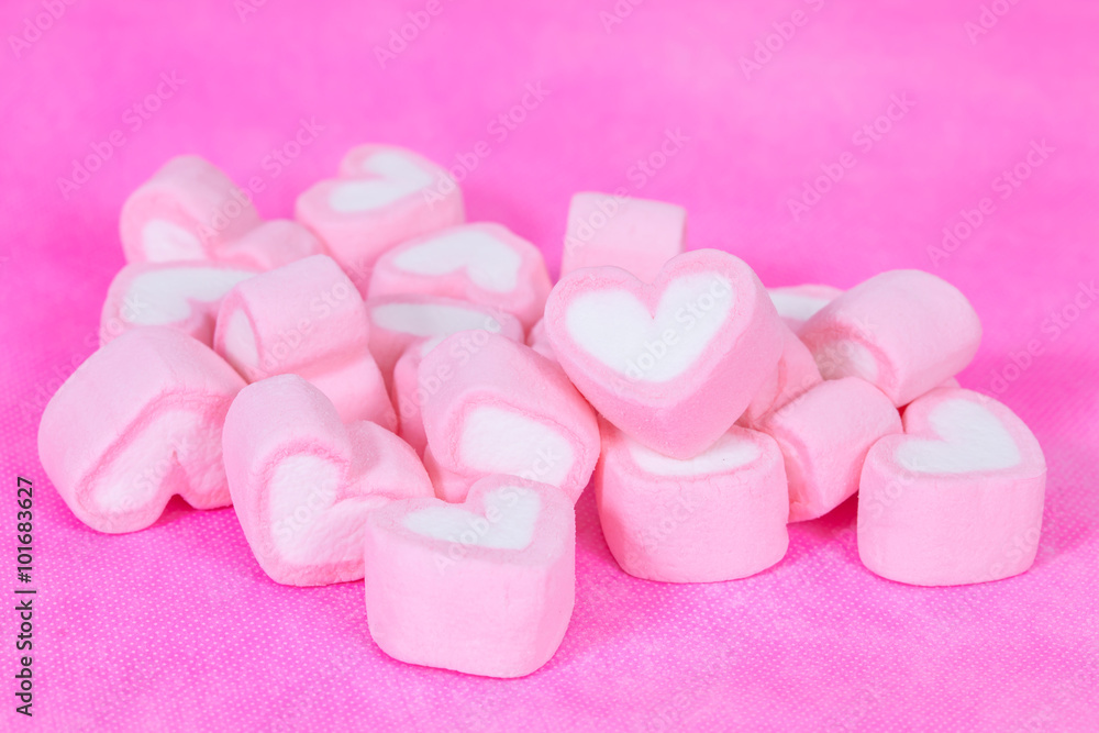 heart shaped candies on background,selective focus. heart shaped candies on background,selective focus.