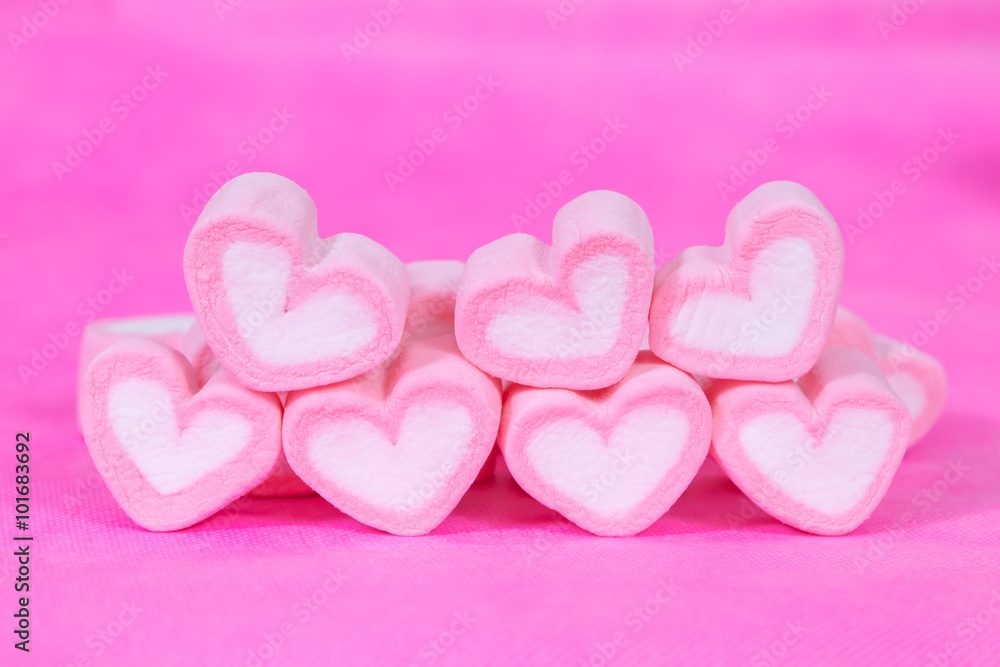 heart shaped candies on background,selective focus.