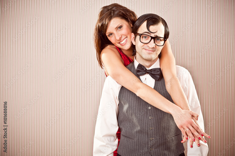 Φωτογραφία nerd boyfriend man and beautiful woman couple in love close portrait for Valenti