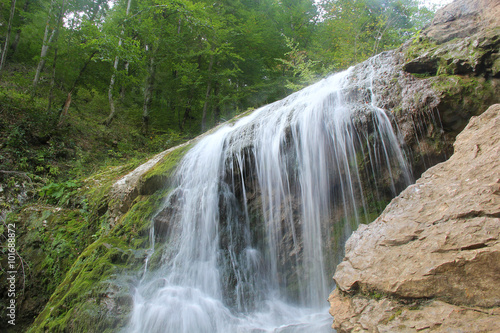 Fototapeta Naklejka Na Ścianę i Meble -  Deep forest waterfall autumn