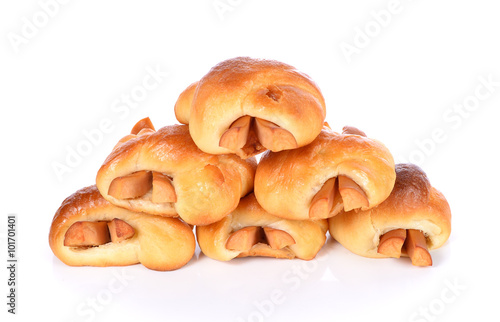 Bread stuffed with hotdog on white background