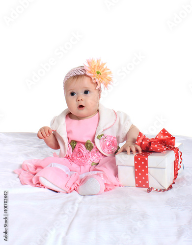 Adorable baby girl  with gifts