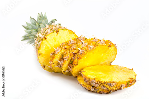 Sliced healthy fresh pineapple on white background