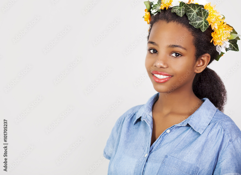 Beautiful girl with wreath of flowers in her hair Young pretty African ...