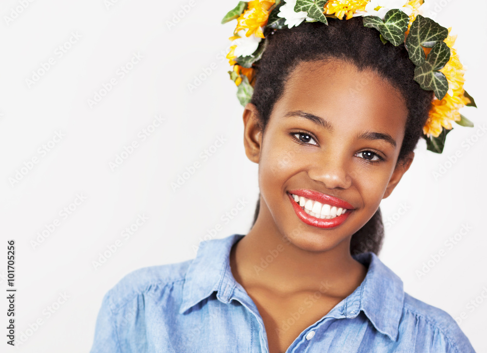 Beautiful girl with wreath of flowers in her hair Young pretty African ...