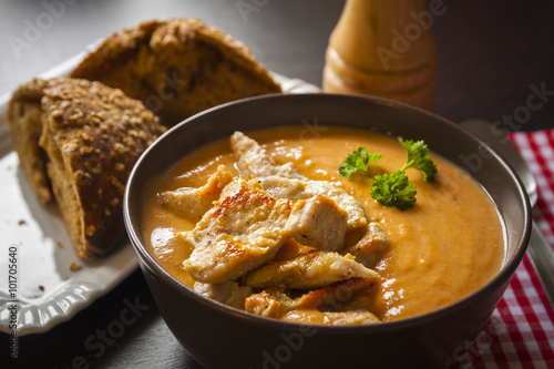 Carrot soup with chicken, bread