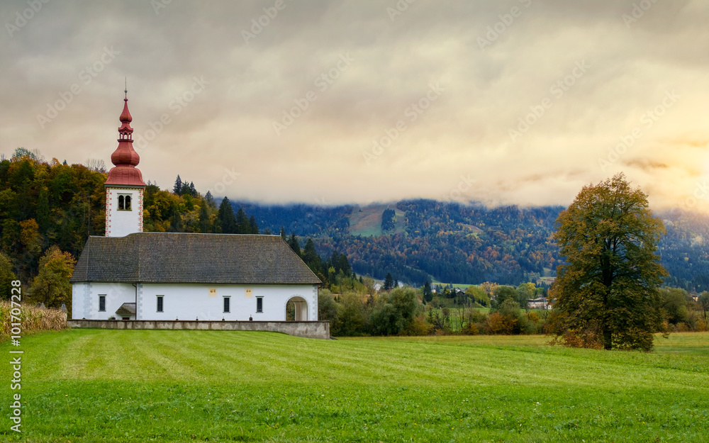 Lonely church in the mountain near the Lake Bohinj Lonely church in the mountain near the Lake Bohinj