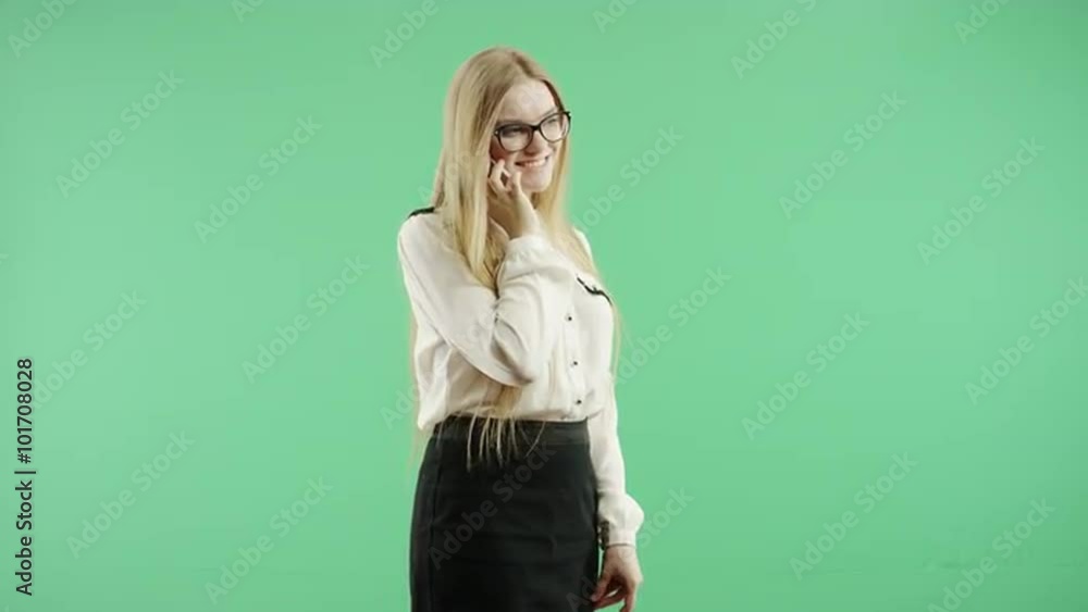 Business woman speaks on the phone green screen Business woman speaks on the phone green screen