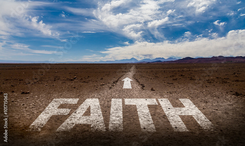 Faith written on desert road