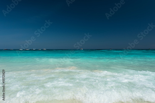 Fototapeta Naklejka Na Ścianę i Meble -  Water splash and clear on beautiful beach ,Located at Ta Cai Island ,Thailand