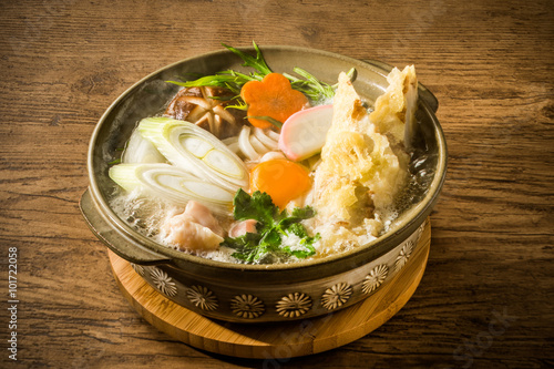一般的な鍋焼きうどん udon in a pot with broth japanese food