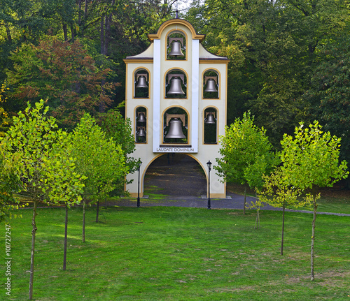 Belfry in the park of palace, Kamien Slaski, shrine of St. Jack photo