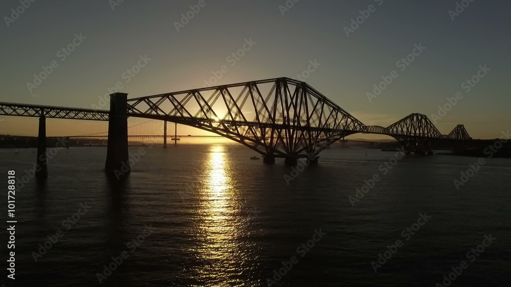 Stunning aerial shot of the Forth Rail Bridge from in South Queenferry during a sunset
Stunning aerial shot of the Forth Rail Bridge from in South Queenferry during a sunset