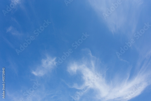 wind blowing cloud on clear blue sky background