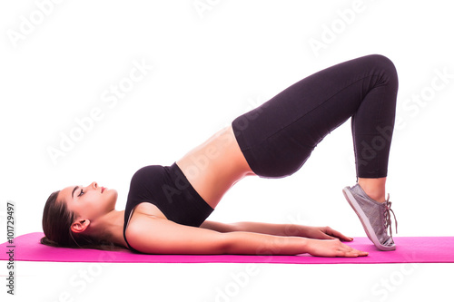 Slim fitness young woman Athlete girl doing plank exercise at home concept training workout crossfit gymnastics cross fit.