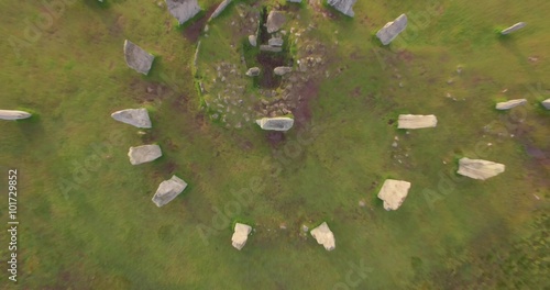 Cinematic aerial shot of Callanish standing stones on the Isle of Lewis, Outer Hebrides, Scotland
