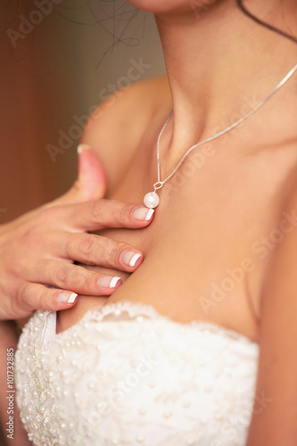 necklace on the woman's neck photo
