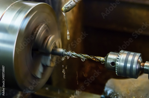 Fototapeta Drilling details on a lathe. Close-up