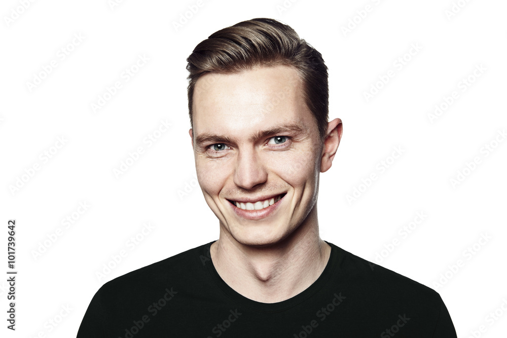 Portrait of young man smiling to camera Portrait of young man smiling to camera