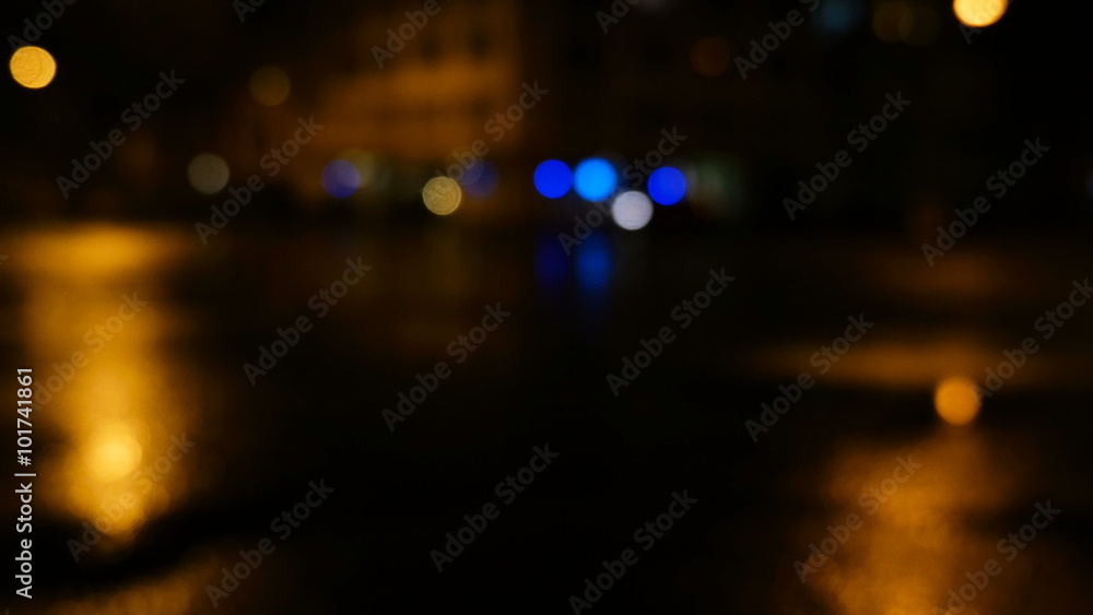 Handheld shot of defocused lights city night traffic Handheld shot of defocused lights city night traffic