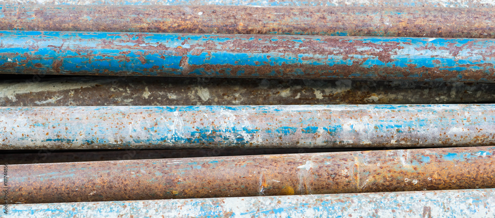 Texture of rusty and stained iron pipes