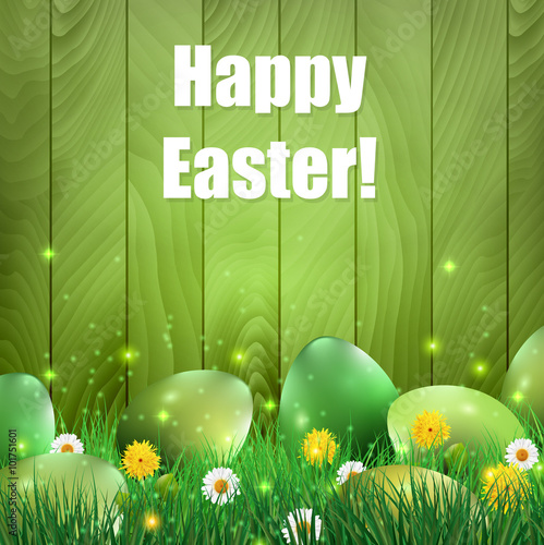 Green Easter eggs with a green wooden background.