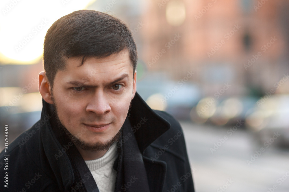 Man with a raised eyebrow Man with a raised eyebrow