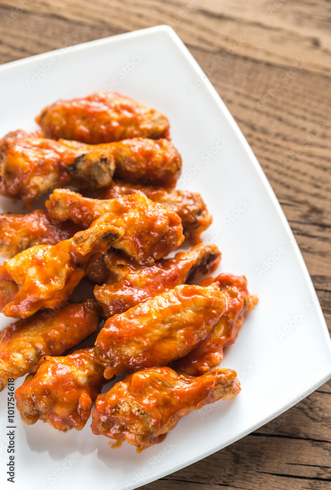 Portion of buffalo chicken wings Portion of buffalo chicken wings