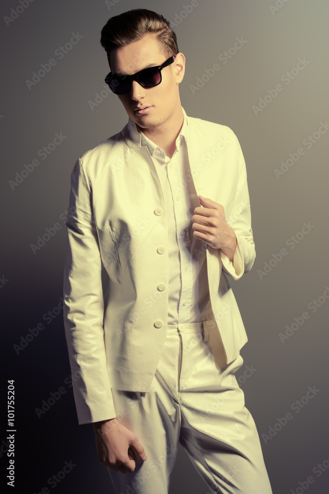 model in white suit