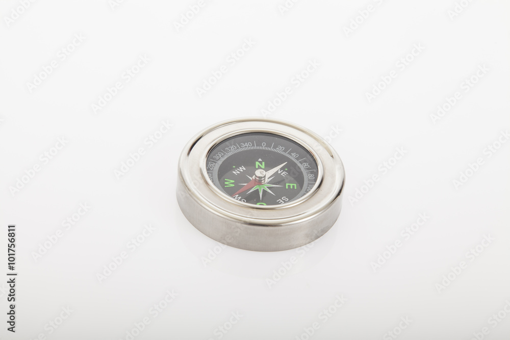 a compass on neutral background a compass on neutral background