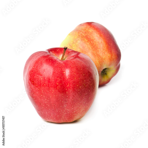 two red apples on a white background