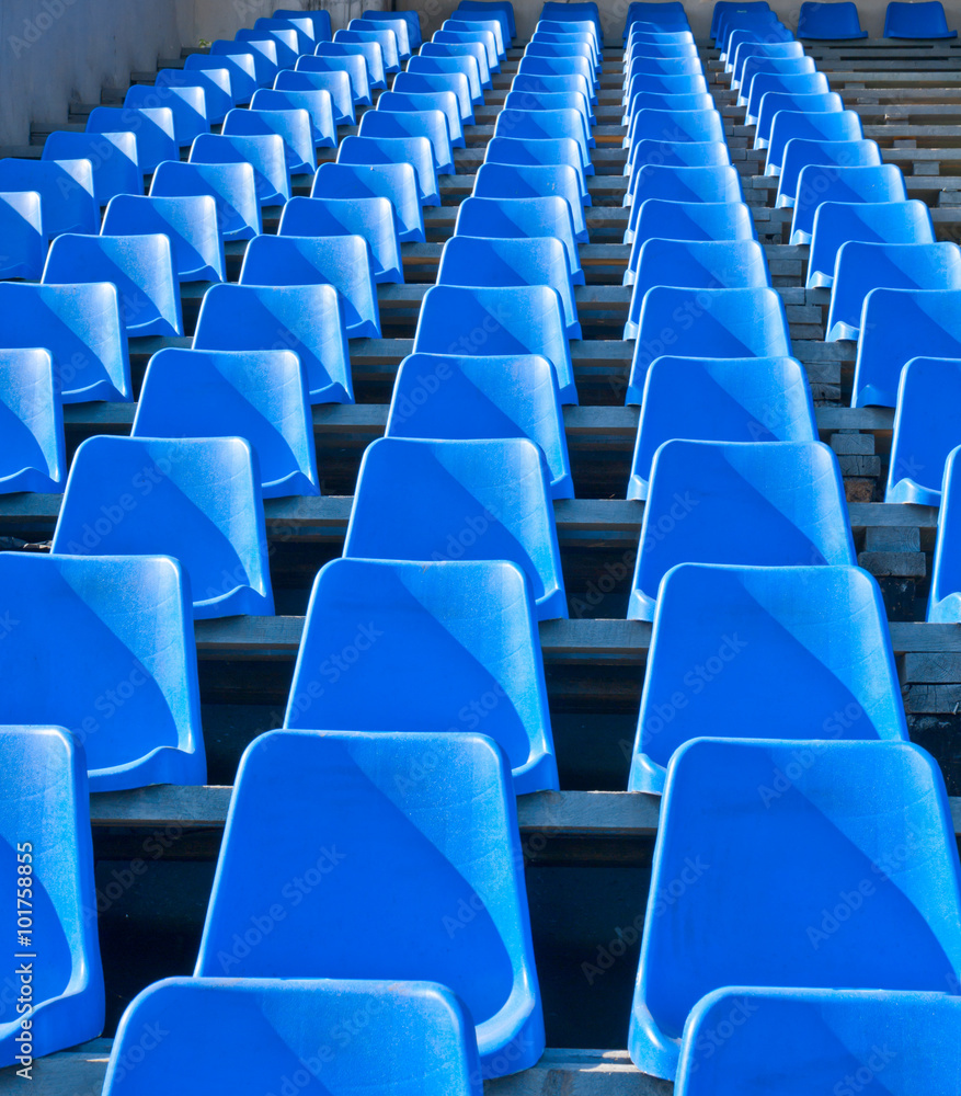 seats are empty on the tribune of stadium seats are empty on the tribune of stadium