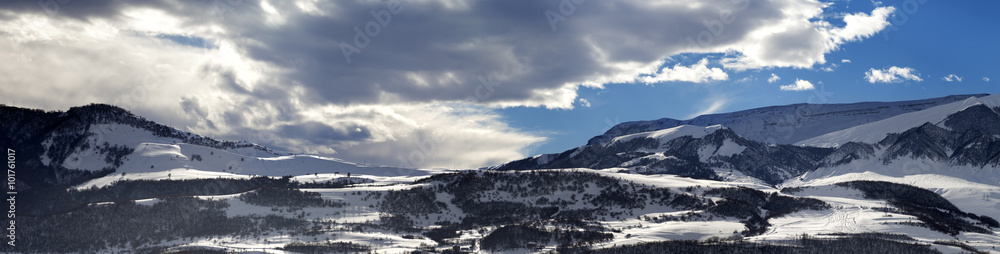 Panorama of winter mountains at evening
